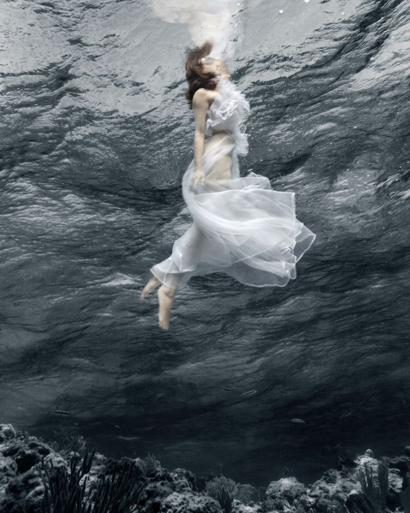 Underwater photographs of rising, shimmering figures that look like oil ...