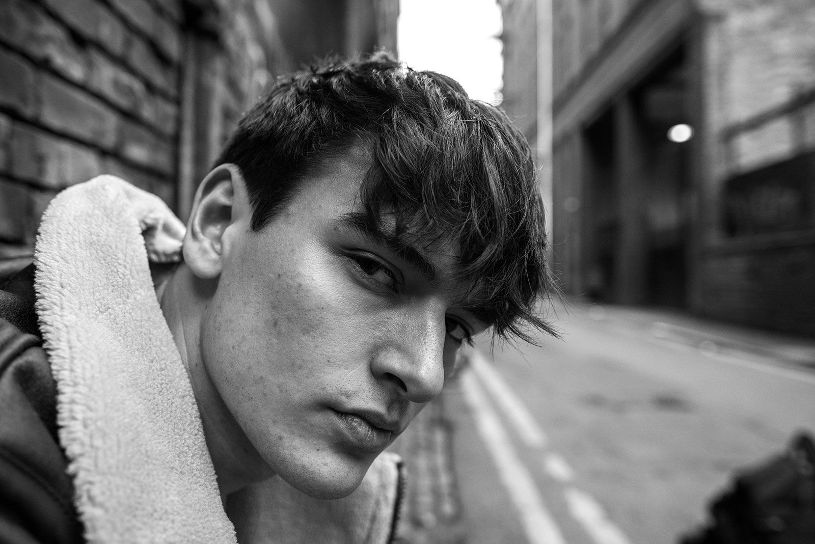 Black and white portraits of people in Manchester on the city's famous