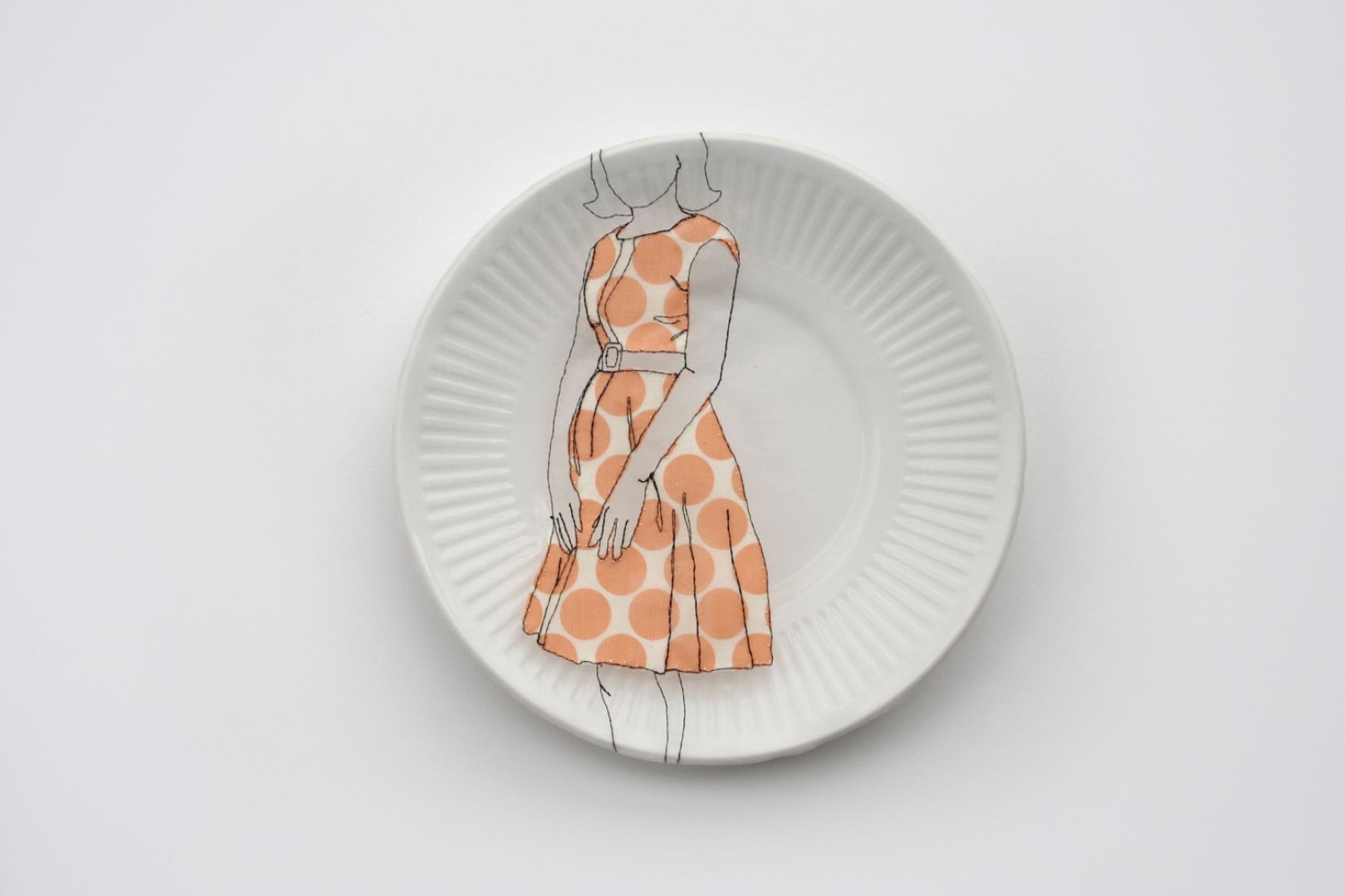 Artist combines ceramics with embroidered artwork to create delicate ...