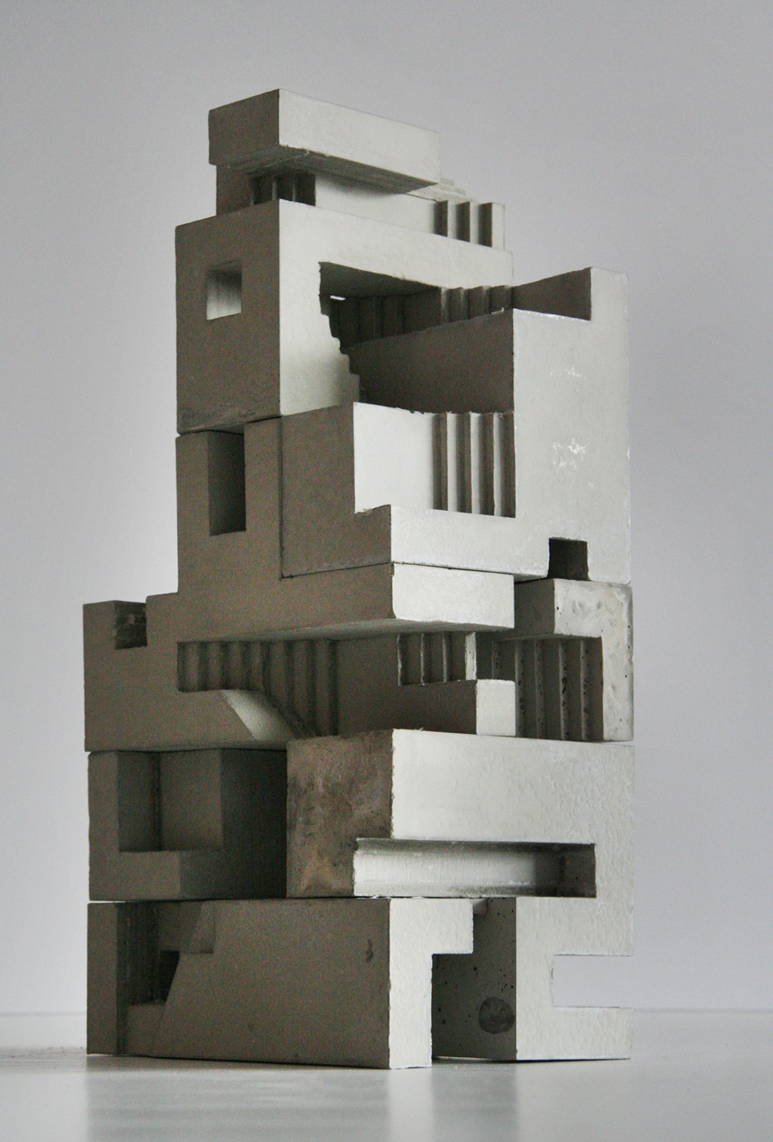 miniature concrete sculptures of brutalist structures can