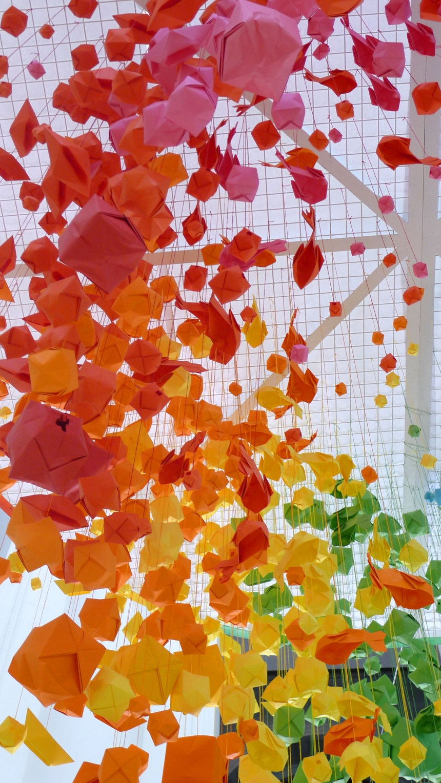 Giant, rainbow hanging installation of 1,000 origami spheres, fish and boats Creative Boom